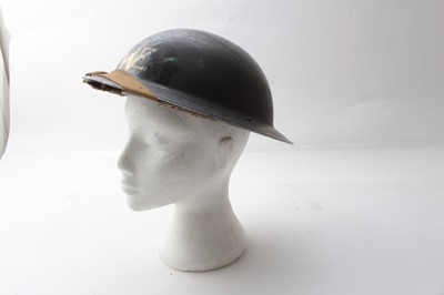 Lot 230 - Second World War British Military MKII Steel Helmet with black painted finish and white lettering to front- R.P.E. (Repair Party / Electricity, and overpainted with W for Warden, with chinstrap and...