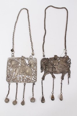 Lot 82 - Two Old Chinese white metal necklaces with embossed plaque depicting a figure on a dragon/horse