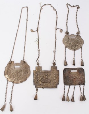 Lot 83 - Four Old Chinese white metal necklaces with embossed plaques depicting figures, dragons and flowers