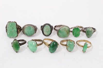 Lot 88 - Eleven Chinese green hardstone/jade rings
