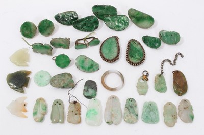 Lot 90 - Group Chinese green hardstone/ jade pendants, screw back earrings and carvings