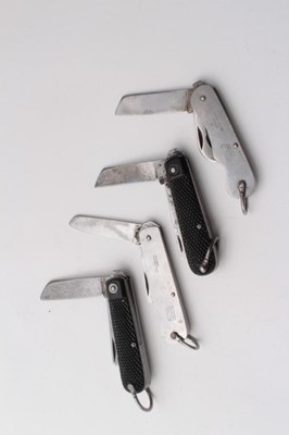 Lot 343 - Second World War British Military Steel folding pocket knife by Wostenholm of Sheffield, dated 1945, together with another dated 1954 and two other folding steel pocket knives with chequered Bakeli...