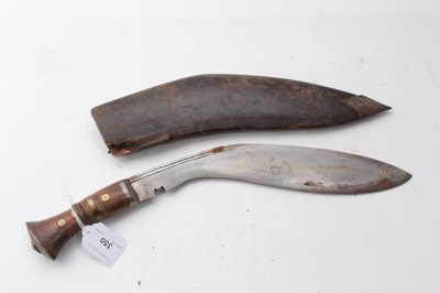 Lot 350 - Gurkha Kukri with steel blade, in brown leather covered sheath, 45cm overall, blade 30.5cm in length