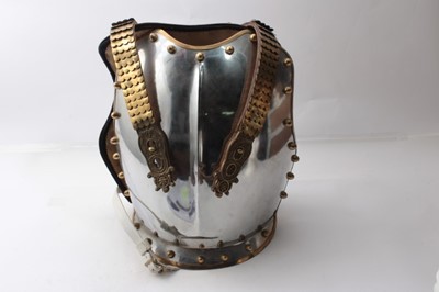 Lot 826 - Fine pair Elizabeth II Household Cavalry Cuirrases comprising plated steel breast and back plates with brass trimmings and shoulder straps and original kid leather lining and buff leather front str...