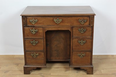 Lot 725 - George IiI mahogany kneehole desk
