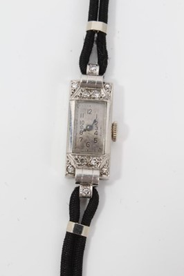 Lot 150 - 1920s platinum and diamond set cocktail watch