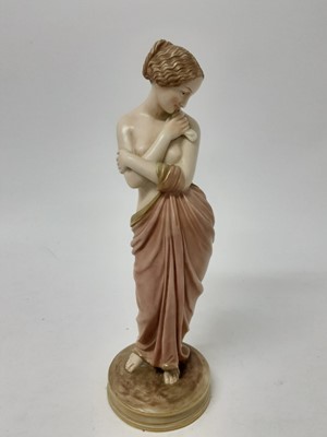 Lot 557 - Royal Worcester Blush Ivory figure - semi clad female