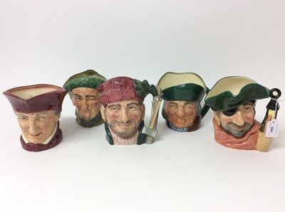 Lot 564 - Five Royal Doulton character jugs - Smuggler D6616, Toby Philpots, Auld Mac, Lumberjack D6610 and The Cardinal