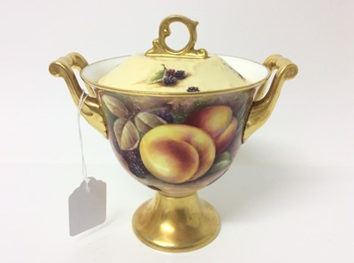 Lot 628 - Coalport twin-handled vase and cover painted with fruit, signed Budd, 17.5cm height (lid does not match)