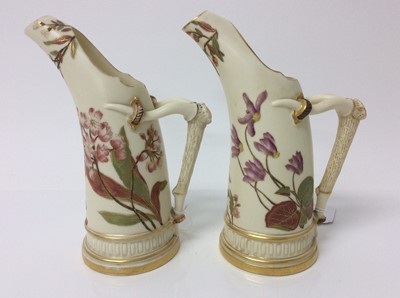 Lot 629 - Pair of Royal Worcester blush ivory tusk ewers, model number 1116, 19cm height