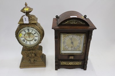 Lot 2032 - Ornate American mantel clock in gilt case By the Ansonia Clock Co. New York and another oak mantel clock (2)