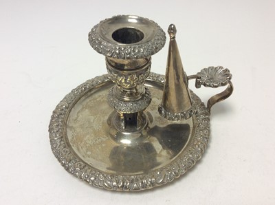 Lot 219 - George III silver chamber stick of circular form with cast floral and scroll borders, engraved armorial, removable snuffer also with engraved armorial and urn shaped candle holder