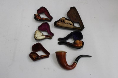 Lot 2001 - Six antique meerschaum pipes to include one depicting a gun dog carrying a hare