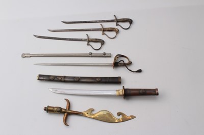 Lot 272 - First World War Brass Trench Art letter opener together with a letter opener in the form of a Japanese Katana and other similar letter openers (6)