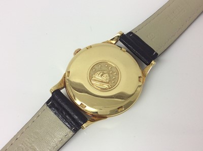 Lot 407 - 1960s gentlemens Omega 18ct gold Constellation wristwatch on omega black leather strap