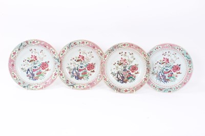 Lot 19 - Set of four 18th century Chinese famille rose export porcelain dishes, Yongzheng/Qianlong period, each painted with a floral pattern with central vase motif, the borders with floral patterns on geo...