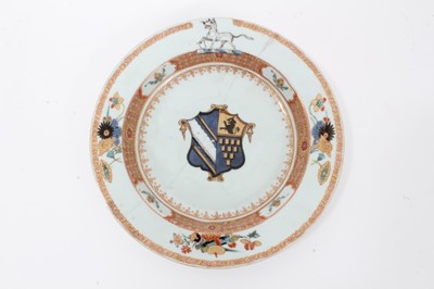 Lot 25 - Good quality 18th century Chinese famille rose armorial porcelain dish, the centre painted with coat of arms, surmounted by a hound on the border, with floral patterns and precious objects, 22.75cm...