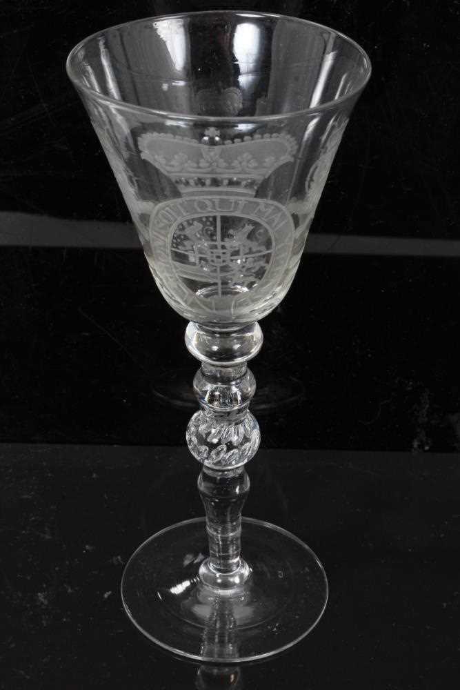 Lot 40 - Georgian 'Newcastle' light baluster armorial wine glass