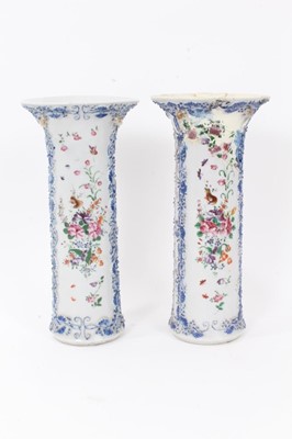 Lot 44 - Pair antique Chinese Qianlong period famille rose sleeve vases, painted with flowers, birds and insects, with relief moulded vine and squirrel decoration, 25.5cm height