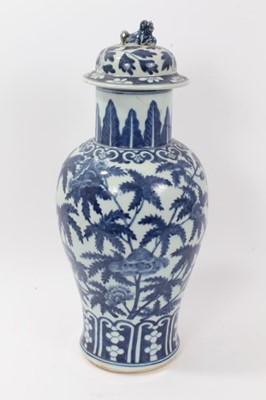 Lot 52 - Large antique late 19th century Chinese blue and white porcelain vase and cover, of baluster form, decorated with foliate patterns, the cover with foo dog knop, total height 48cm