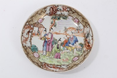 Lot 54 - Antique 18th century Chinese famille rose export porcelain saucer, painted in the Mandarin style with a figural scene, including a seated man having his feet washed, 15cm diameter