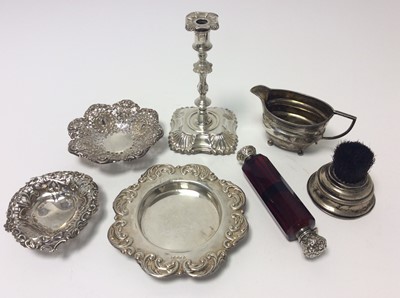 Lot 172 - Victorian silver taper stick (London 1891) together with an Edwardian silver pen wipe (Birmingham 1904), George V silver cream jug (Sheffield 1911)