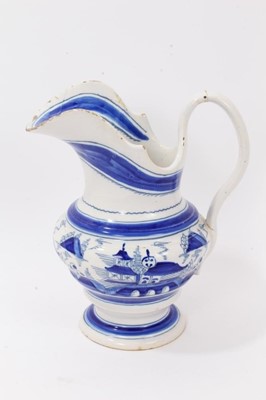 Lot 53 - 19th Century tin glazed pottery jug with blue and white chinoiserie decoration