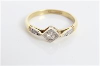 Lot 3350 - Gold (18ct) diamond single stone ring with two...