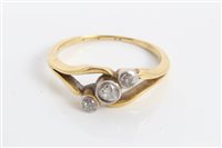 Lot 3351 - Gold (18ct) diamond three stone ring in...
