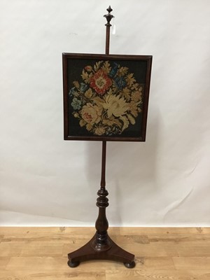 Lot 890 - Early Victorian mahogany pole screen