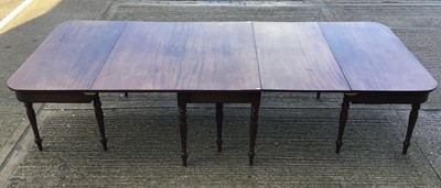 Lot 883 - Regency mahogany D-end dining table with central hinged section and twin D-ends, raised on ring turned legs, 312cm long x 128cm extended