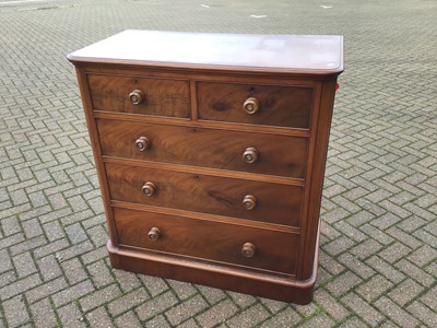 Lot 72 - Victorian mahogany chest of two short and three long drawers with turned handles on plinth base