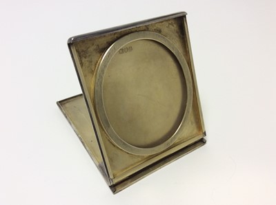 Lot 150 - Unusuall late Victorian silver travelling photograph frame of rectangular form with sliding, folding action and gilded interior, (London 1899)