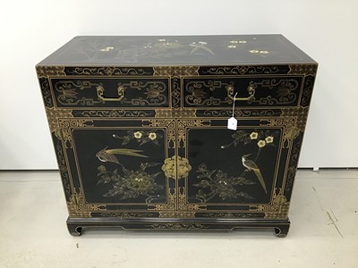 Lot 4 - Chinese black lacquered cupboard with chinoiserie gilded decoration, two drawers and cupboards below