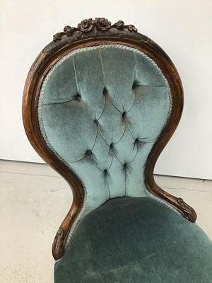 Lot 81 - Mid Victorian rosewood upholstered spoon back chair