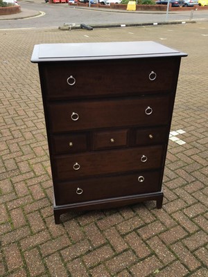 Lot 130 - Stag mahogany Minstrel bedroom furniture to include a pair of tall chest of drawers, pair of bedside chests of four drawers, and a long chest of drawers