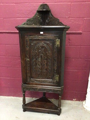 Lot 176 - Victorian mahogany carved oak corner cupboard on stand