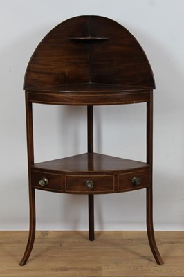 Lot 930 - George III mahogany corner washstand with raided shaped back, two tiers, single drawer, on splayed legs, 57cm wide x 116cm high