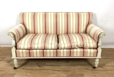 Lot 940 - Late Regency painted two seater salon sofa with carved and reeded arm supports and fluted legs terminating on castors, with striped upholstery, 135cm wide x 74cm high x 75cm deep
