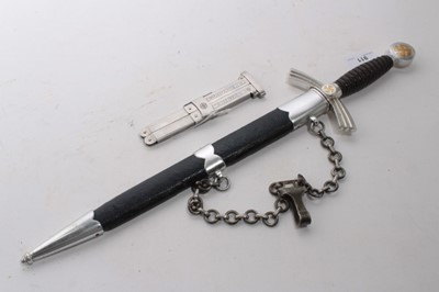 Lot 911 - Good Quality replica Nazi First pattern Luftwaffe Officers Dress Dagger with hangers, together with a Good Quality replica Nazi Red Cross / DRK Leader's Dagger and one other replica folding Nazi Ge...