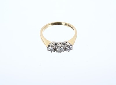 Lot 674 - Diamond three stone ring
