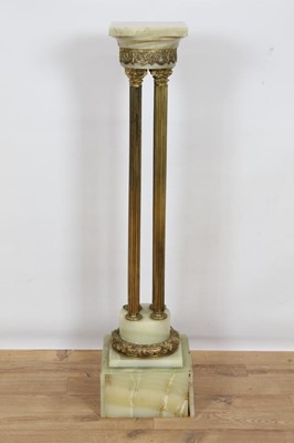 Lot 795 - Continental alabaster and ormolu mounted torchere