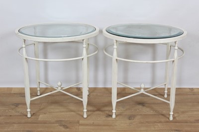 Lot 770 - Set of four glass topped metal side tables