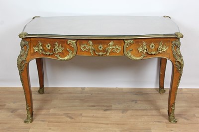 Lot 771 - Late 19th / early 20th century French parquetry and gilt metal mounted bureau plat, in the Louix XV style, retailed by Edwards and Roberts