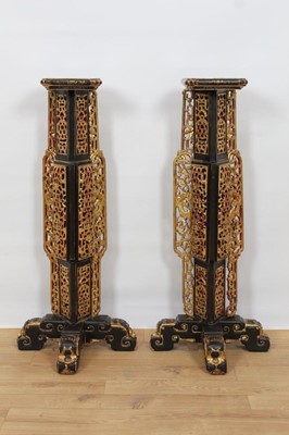 Lot 773 - Pair of Chinese lacquered and pierced gilt pedestals, probably comprising 19th century elements