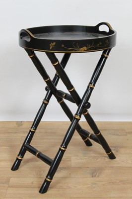 Lot 809 - Regency style black lacquer tray on collapsing stand