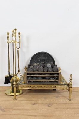 Lot 812 - George III style steel and brass fire basket and tools