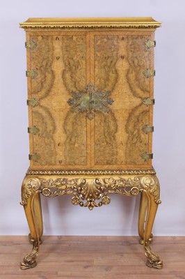 Lot 767 - Fine quality George I style figured walnut veneered drinks cabinet on giltwood stand, possibly by Waring & Gillows