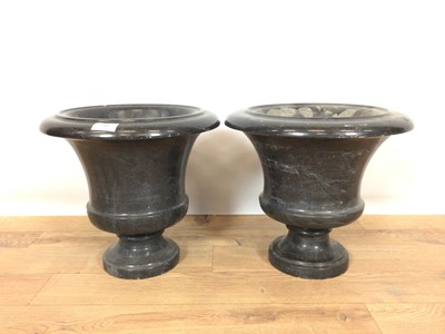 Lot 752 - Pair of black marble campana shape urns