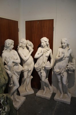 Lot 815 - Set of four composite white painted statues representing the four seasons
